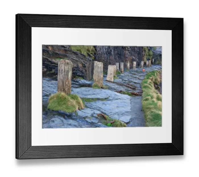 Framed Print : Boscastle. A row of bollards on the quayside around the harbour in the Framed Print : Boscastle. A row of bollards on the quayside around the harbour in the