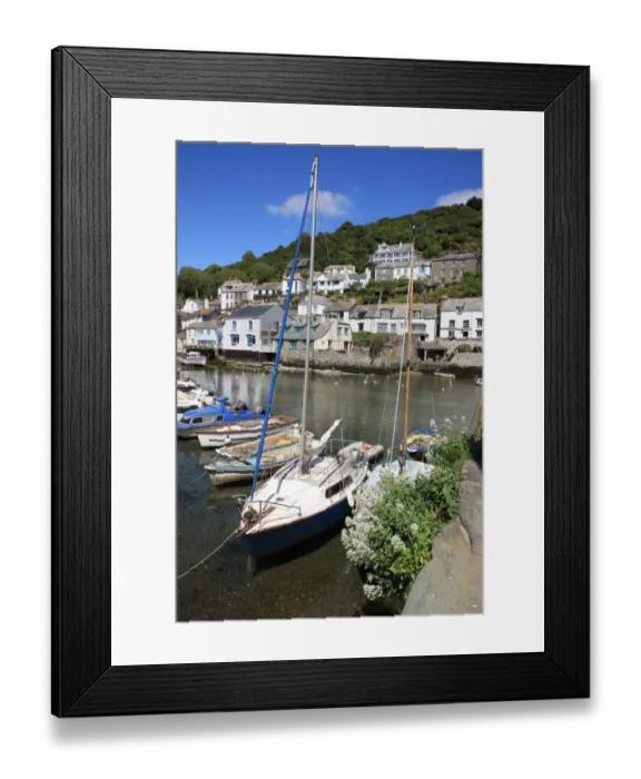 Framed Print : Polperro. The picturesque fishing village of Polperro on the south coast of Cornwall Framed Print : Polperro. The picturesque fishing village of Polperro on the south coast of Cornwall
