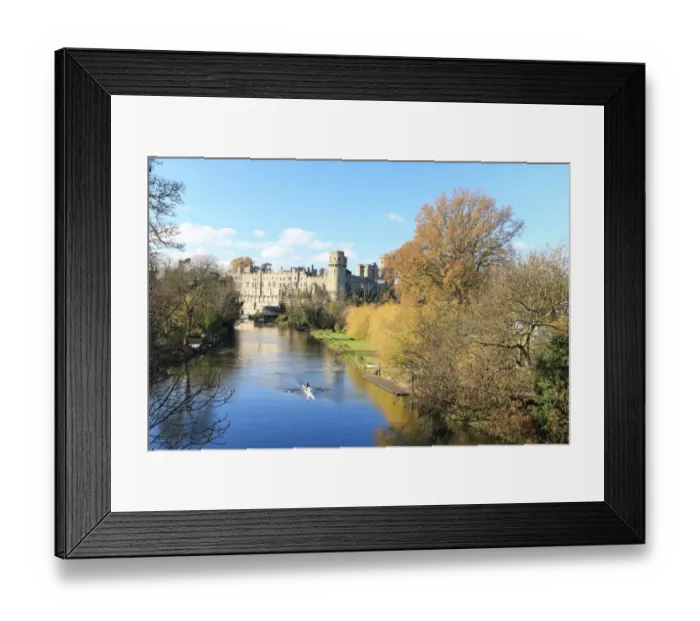 Framed Print : Warwick. A rowing boat on the river Avon below the castle at Warwick Framed Print : Warwick. A rowing boat on the river Avon below the castle at Warwick