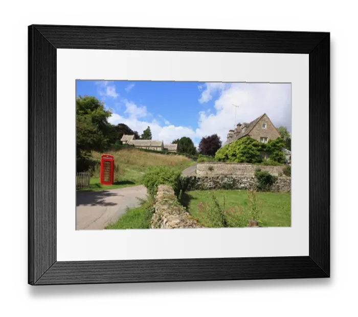 Framed Print : Phone Box. Duntisbourne Abbots Glos Cotswolds Summer. Village church Phonet box