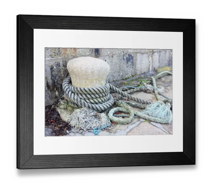 Framed Print : Bollard. A Bollard and ships ropes on the Quayside in the Cornish fishing Framed Print : Bollard. A Bollard and ships ropes on the Quayside in the Cornish fishing