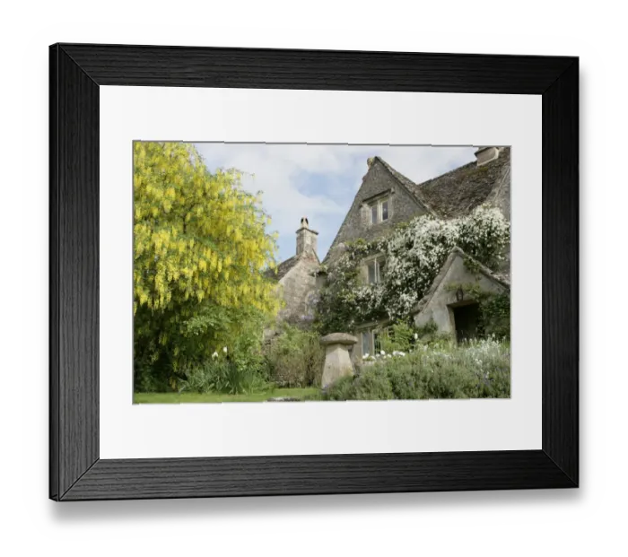Framed Print : Calmsden. A spring day in the cotswold village of Calmsden with its old farm house