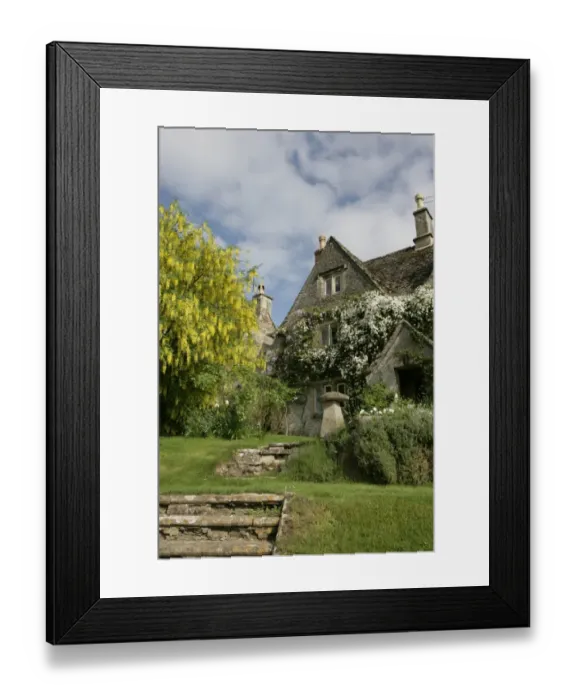 Framed Print : Calmsden. A spring day in the cotswold village of Calmsden with its old farm house