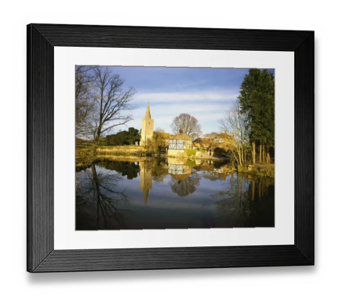 Framed Print : Staunton. The Timber Framed Dovecote and Church reflected in the fishing Framed Print : Staunton. The Timber Framed Dovecote and Church reflected in the fishing