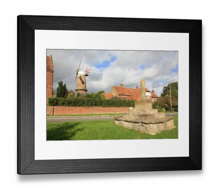 Framed Print : Quainton. The 15th-century stone cross and Windmill built 1830 in the Buckinghamshire Framed Print : Quainton. The 15th-century stone cross and Windmill built 1830 in the Buckinghamshire