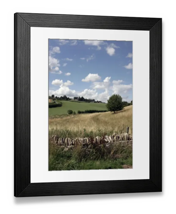 Framed Print : Yanworth. A valley below the cotswold hamlet of Yanworth near Northleach Framed Print : Yanworth. A valley below the cotswold hamlet of Yanworth near Northleach