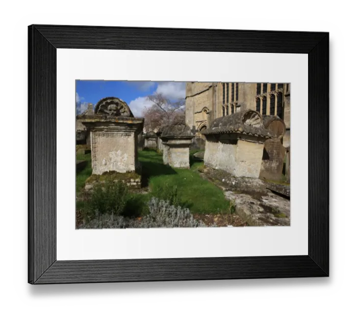 Framed Print : Burford. The Church yard at Burford Oxfordshire on a summers morning Framed Print : Burford. The Church yard at Burford Oxfordshire on a summers morning