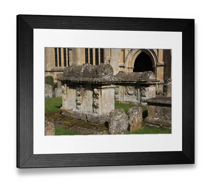 Framed Print : Burford. The Church yard at Burford Oxfordshire on a summers morning Framed Print : Burford. The Church yard at Burford Oxfordshire on a summers morning