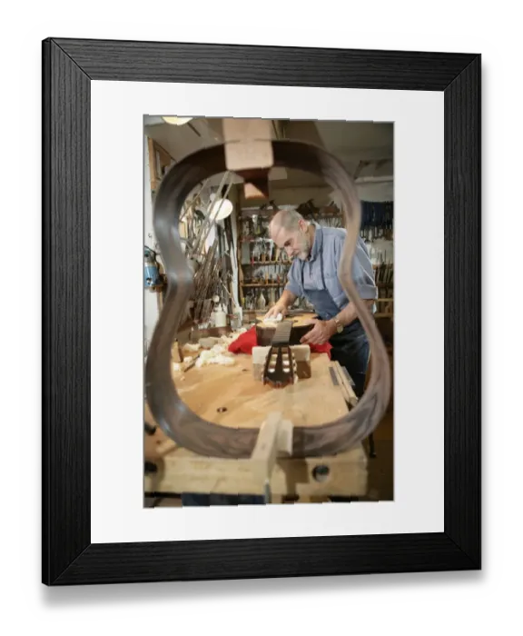 Framed Print : Guitar Maker