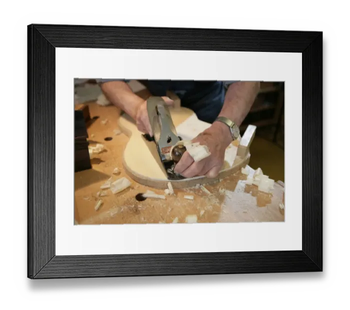 Framed Print : Guitar Maker
