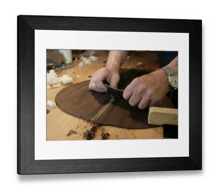 Framed Print : Guitar Maker