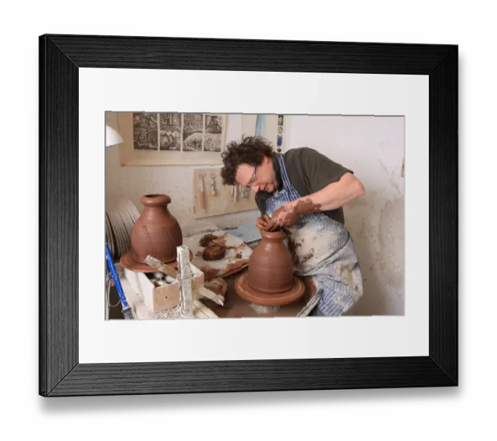 Framed Print : Potter Kevin Millward working on his wheel near Stoke on Trent Framed Print : Potter Kevin Millward working on his wheel near Stoke on Trent