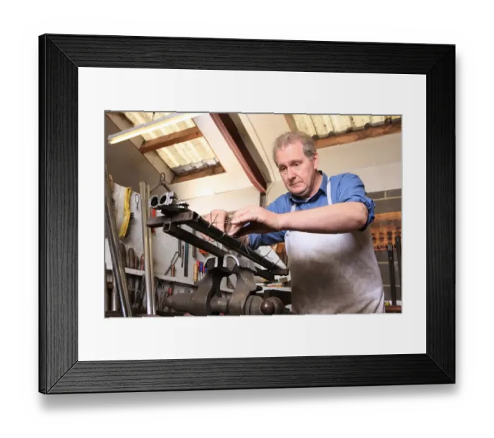 Framed Print : Gunsmith Graham Ball working at John Fosters Carlton near Stockton on Tee