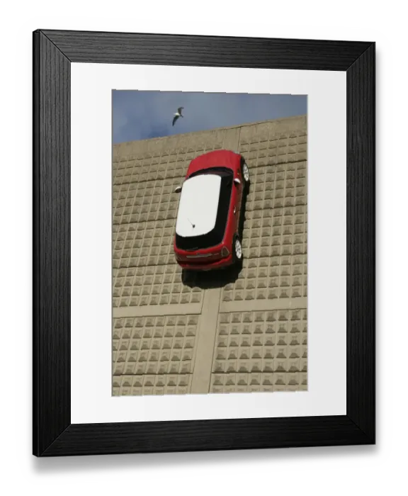 Framed Print : Mini. A Mini on the wall outside the BMW car factory at Swindon Wiltshire Framed Print : Mini. A Mini on the wall outside the BMW car factory at Swindon Wiltshire