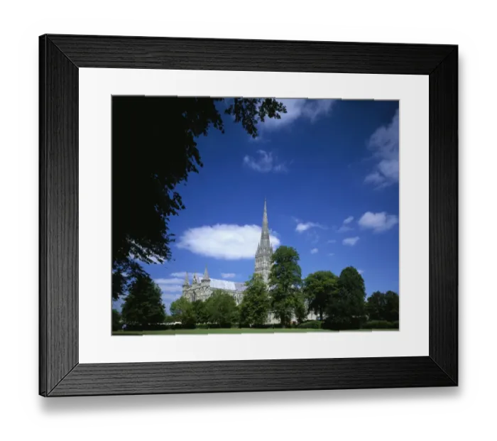 Framed Print : Salisbury. A summers day at Salisbury Cathedral with its 404 ft high spire Framed Print : Salisbury. A summers day at Salisbury Cathedral with its 404 ft high spire