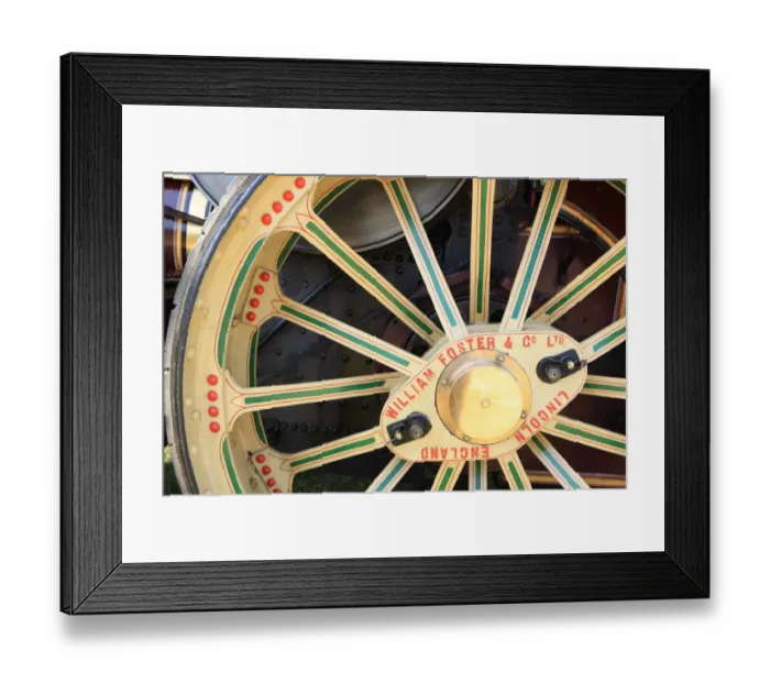 Framed Print : Yellow and Green Wheel