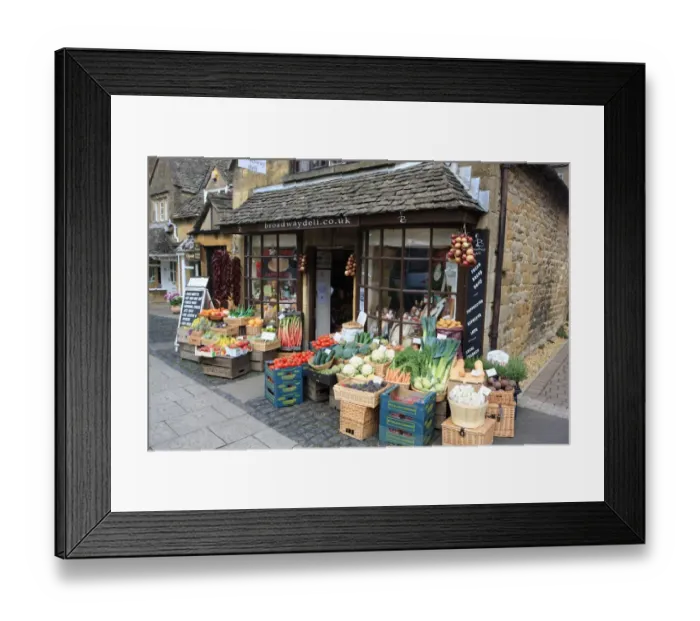 Framed Print : The Shop. Fresh vegetables on display outside a shop in the Cotswold village of Broadway