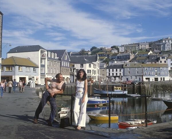 People by the harbour, Mevagissey, Cornwall