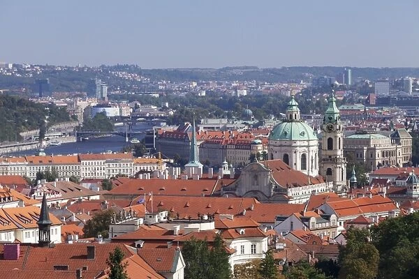 View from Castle District (Hradcany) to Mala Strana suburb with Dome and Tower of St. Nicholas Church and Vltava River, Prague, Bohemia, Czech Republic, Europe