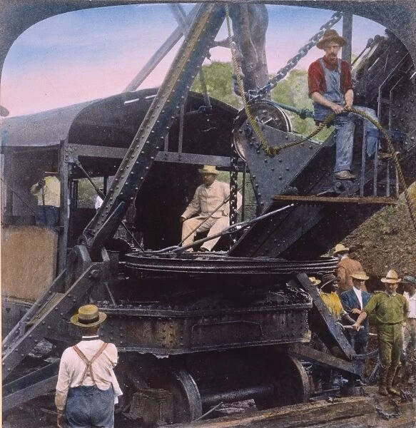 President Theodore Roosevelt (1858-1919) operating a steamshovel at Culebra Cut, Panama, in 1906. Oil over a stereograph