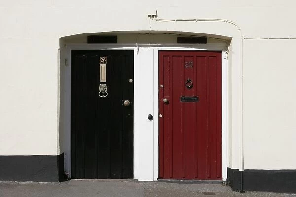 Black and Red Doors. A pair of front doors painted red