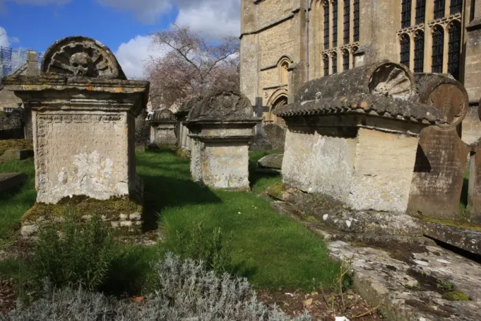Framed Print : Burford. The Church yard at Burford Oxfordshire on a summers morning Framed Print : Burford. The Church yard at Burford Oxfordshire on a summers morning