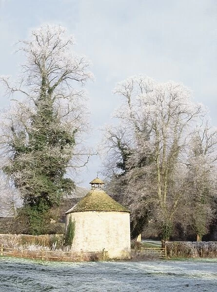 Dovecote. A stone Dovecote in the grounds of Cirencester Park in the Cotswolds