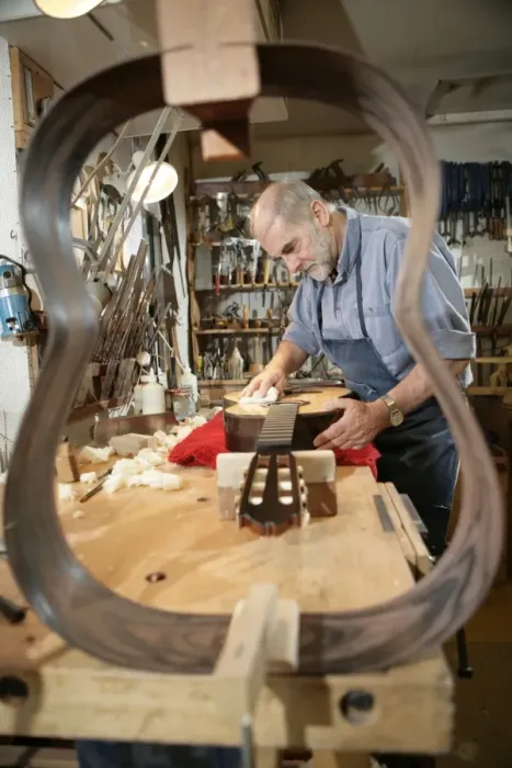 Framed Print : Guitar Maker