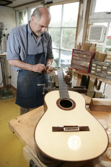 Framed Print : Guitar Maker Framed Print : Guitar Maker