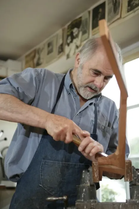 Framed Print : Guitar Maker