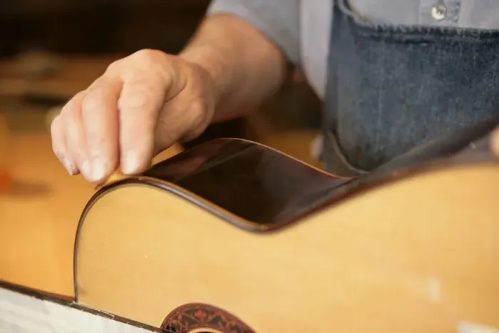 Framed Print : Guitar Maker