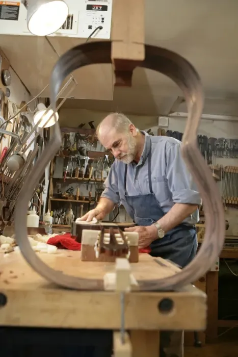 Framed Print : Guitar Maker