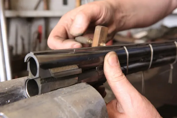 Framed Print : Gunsmith Graham Ball working at John Fosters Carlton near Stockton on Tee