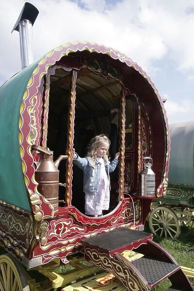 Gypsy caravan. A young visitor to the Gypsy horse fair held at Stow on