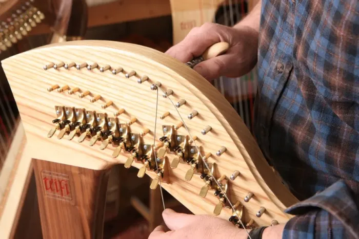 Framed Print : Harps. Harp maker Allan Shiers at The Harp Centre of Wales, at Llandysul Wales Framed Print : Harps. Harp maker Allan Shiers at The Harp Centre of Wales, at Llandysul Wales