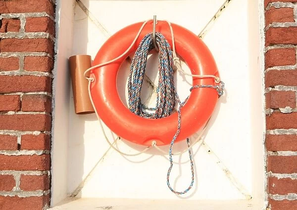 Life belt on the Quayside in the Cornish fishing port of Charlestown on the south coast