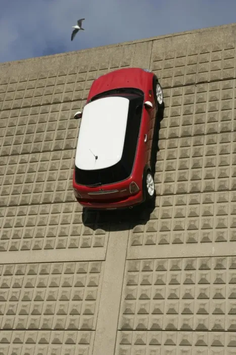 Framed Print : Mini. A Mini on the wall outside the BMW car factory at Swindon Wiltshire Framed Print : Mini. A Mini on the wall outside the BMW car factory at Swindon Wiltshire