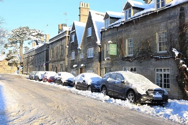 Northleach. Cars parked in the High Stree at Northleach a Cotswold Town