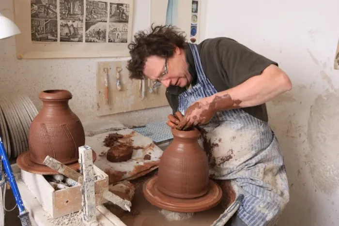 Framed Print : Potter Kevin Millward working on his wheel near Stoke on Trent Framed Print : Potter Kevin Millward working on his wheel near Stoke on Trent