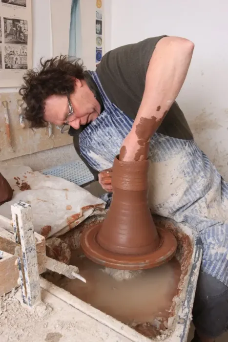 Framed Print : Potter Kevin Millward working on his wheel near Stoke on Trent Framed Print : Potter Kevin Millward working on his wheel near Stoke on Trent