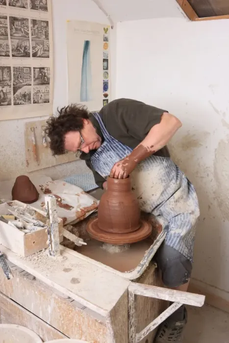 Framed Print : Potter Kevin Millward working on his wheel, near Stoke on Trent Framed Print : Potter Kevin Millward working on his wheel, near Stoke on Trent