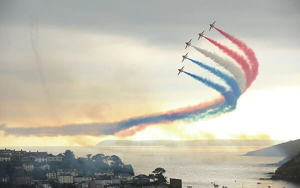 Red Arrows at Fowey. The Red Arrows fly in formation over fowey harbour