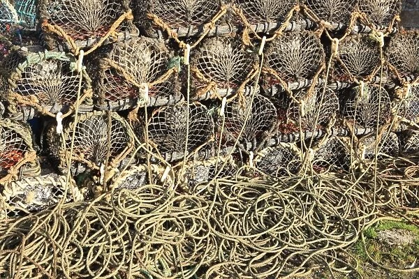 Rope and Potes. Lobster Pots and ropes on the Quayside in the Cornish fishing