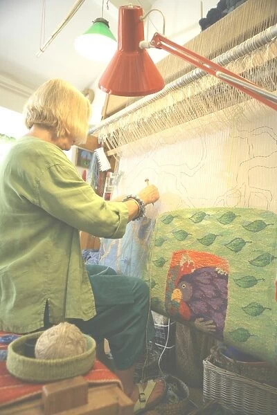 Tapestry. Kirsten Glasbrook working on a Tapestry