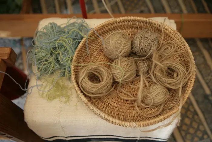 Framed Print : Tapestry. Weaver Kirsten Glasbrook working on a Tapestry