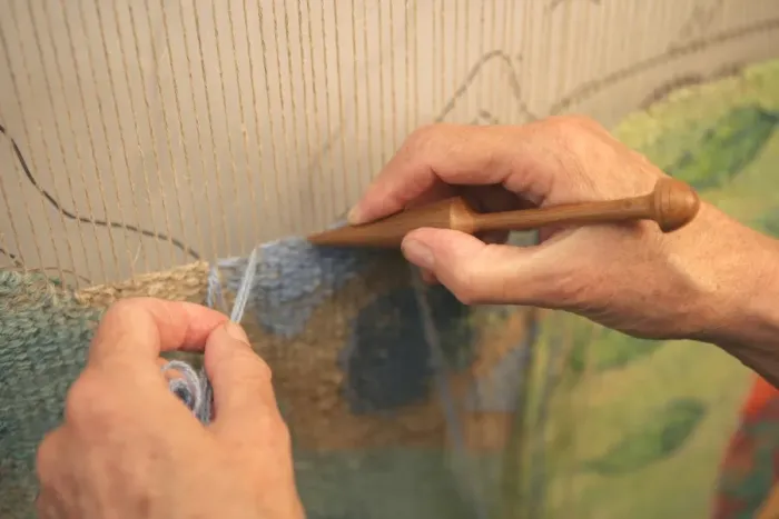 Framed Print : Tapestry. Kirsten Glasbrook working on a Tapestry