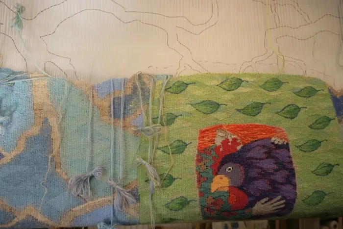 Framed Print : Tapestry. Kirsten Glasbrook working on a Tapestry Framed Print : Tapestry. Kirsten Glasbrook working on a Tapestry