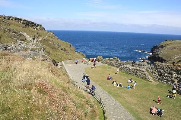 Tintagel Castle. Visitors on the North Cornish at Tintagel Castle on a summers day