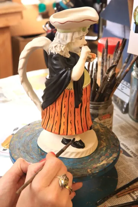 Framed Print : Toby Jugs. Painting Toby Jugs at Peggy Davies Ceramics in Stoke on Trent