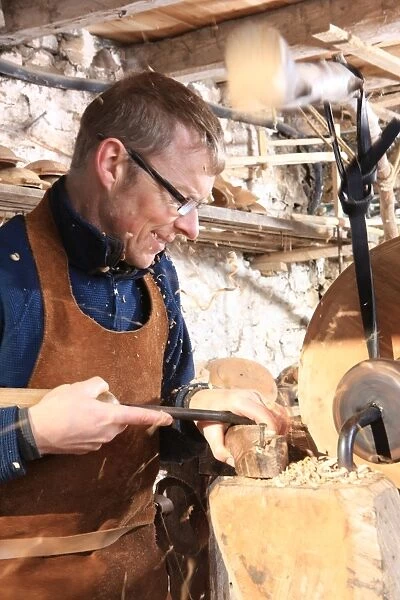 Woodturner Robin Wood and bowls in his workshop at Edale in the peck District